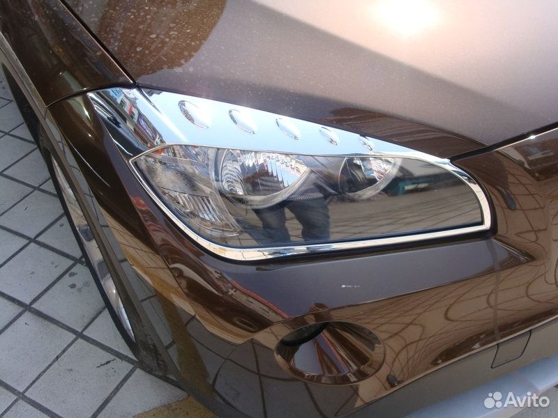 Хромированные накладки на передние фары BMW X1 (20