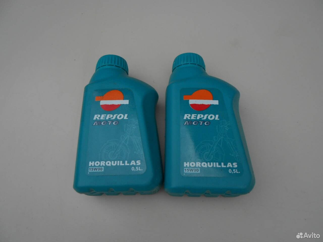 Масло на авито. Масло вилочное 15w Repsol Repsol. Repsol мото horquillas 10w20. Вилочное масло 15w. Масло для амортизатора Repsol.