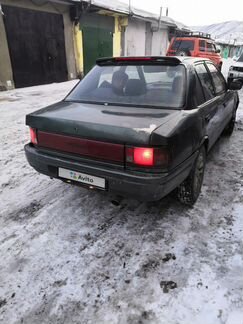 Mazda Familia 1.3 МТ, 1991, 187 986 км