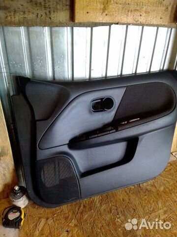 Обшивка двери Nissan Note 11