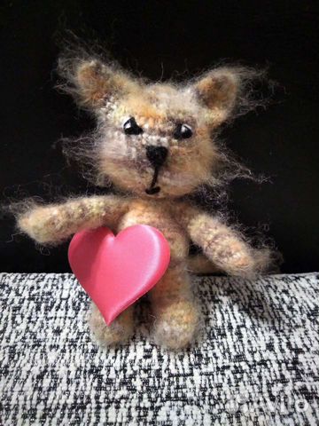 Котенок игрушка