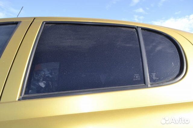 Стекло двери заднее левое Toyota Yaris