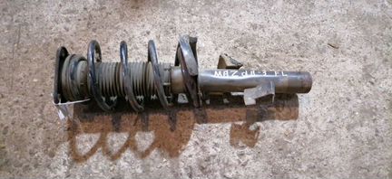 Амортизатор передний левый Mazda 3 2002-2009