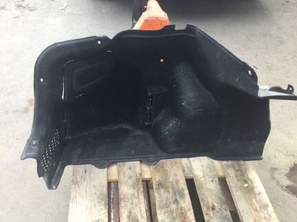 Обшивка багажника левая KIA RIO 857304Y000WK