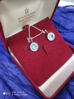 Серьги 585 пробы с голубыми вставками