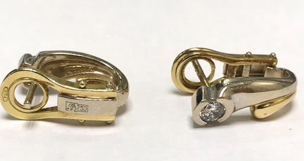 Золотые серьги 750 пробы с бриллиантами